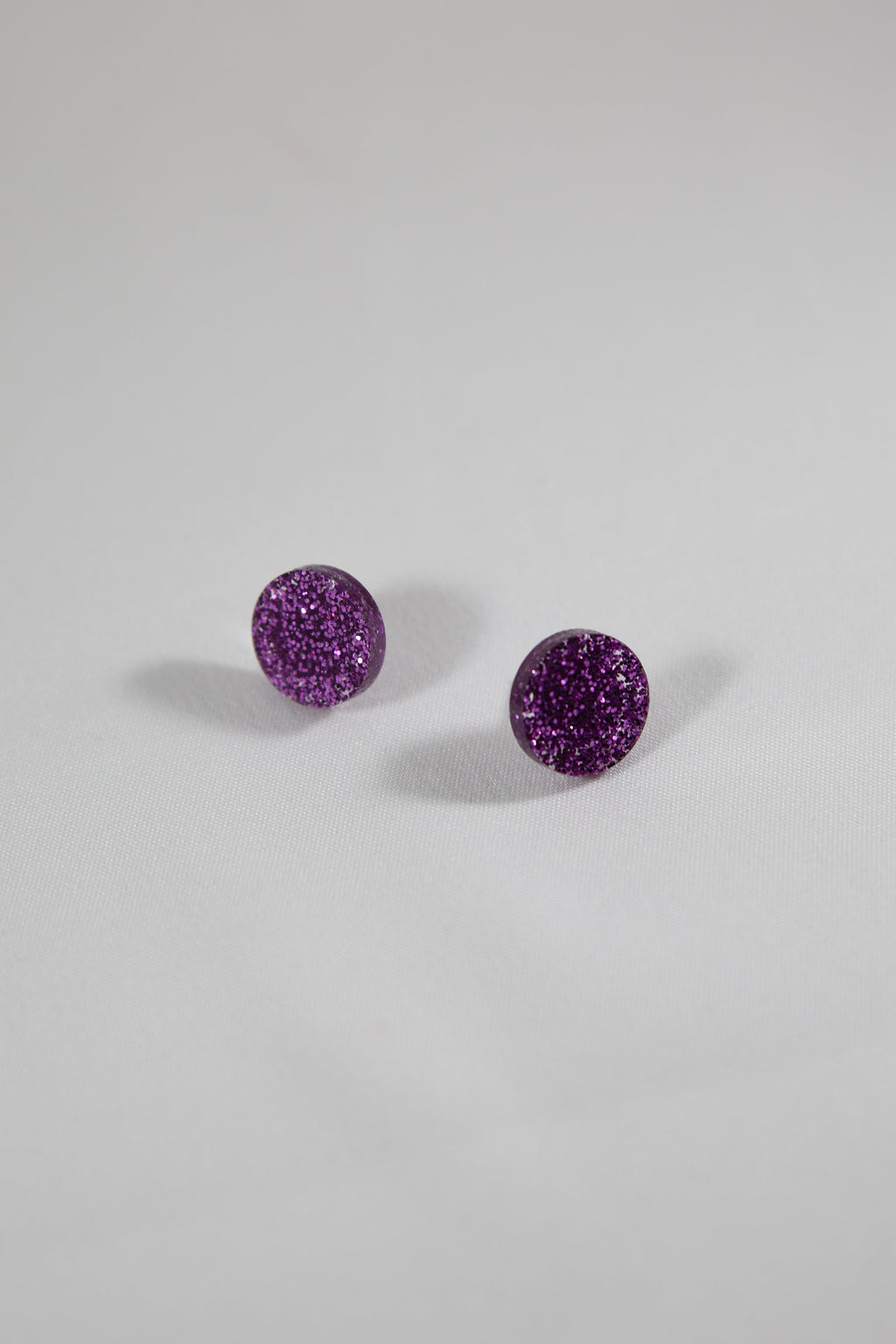Nappikorvakorut Violetti Glitter