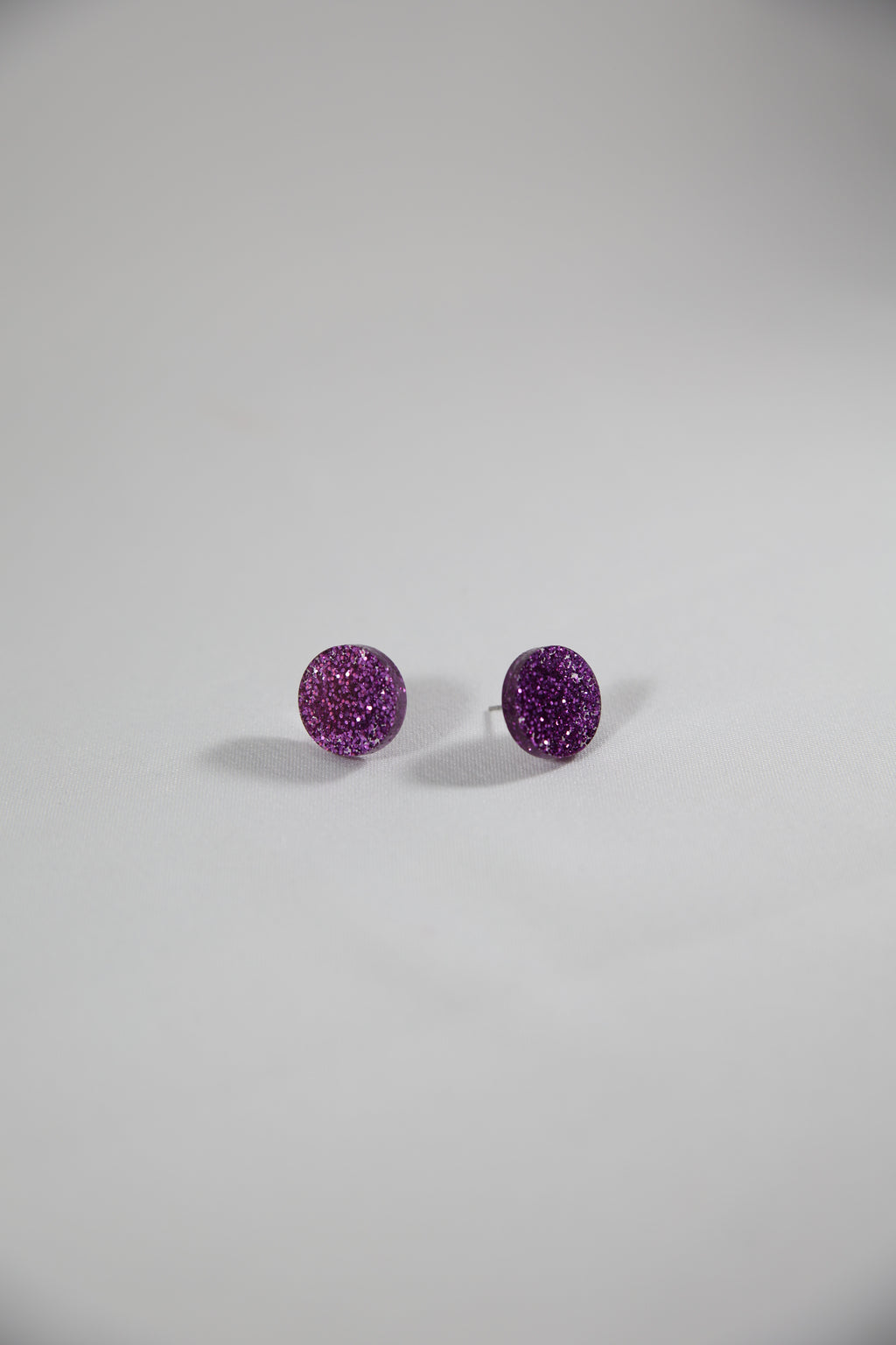 Nappikorvakorut Violetti Glitter