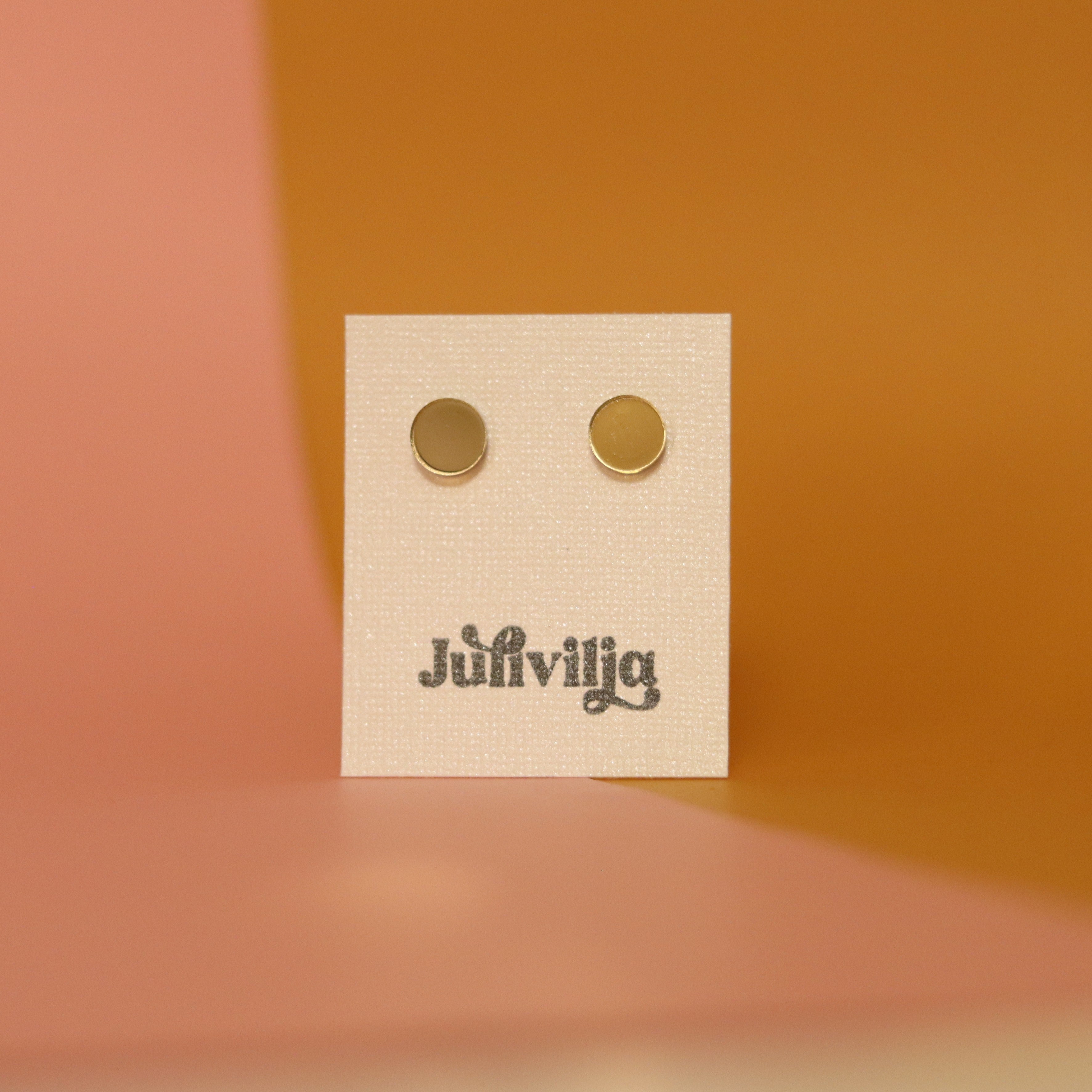 Peili Nappikorvakorut